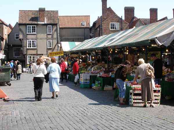 Looking north east through the market towards the Shambles. 