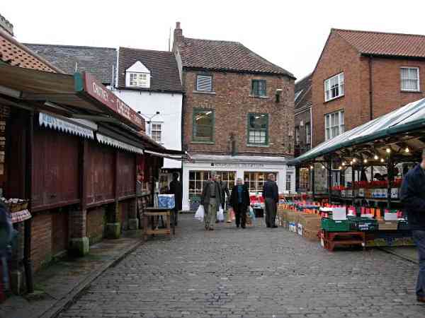The fish and meat market stalls are on the left.
