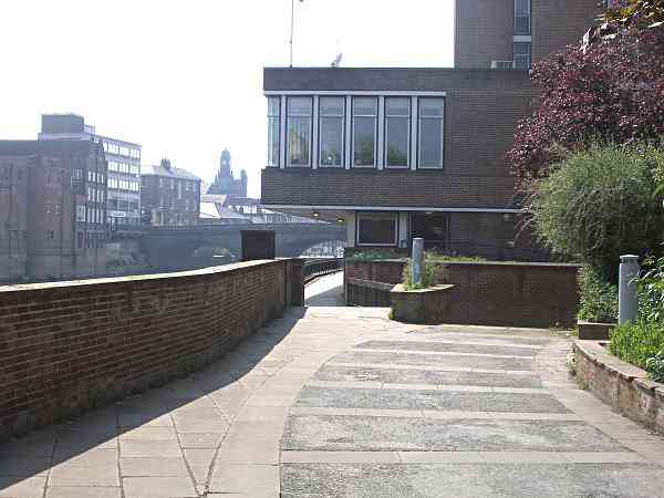 On the south bank of the river looking towards Ouse Bridge.